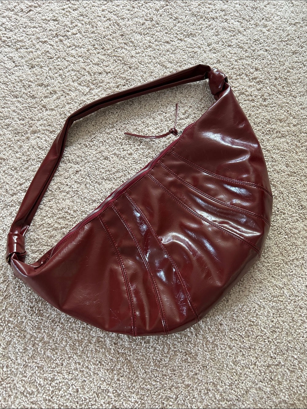 Croissant shaped crossbody bag
